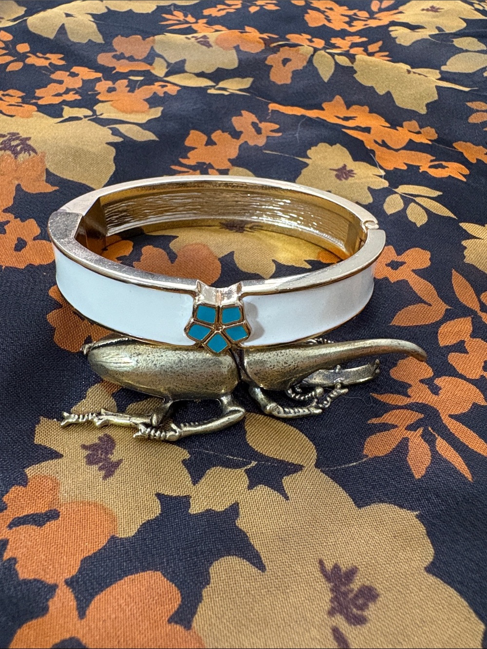 White Enamel Hinged Bangle Bracelet with Geometric Plumeria Accent